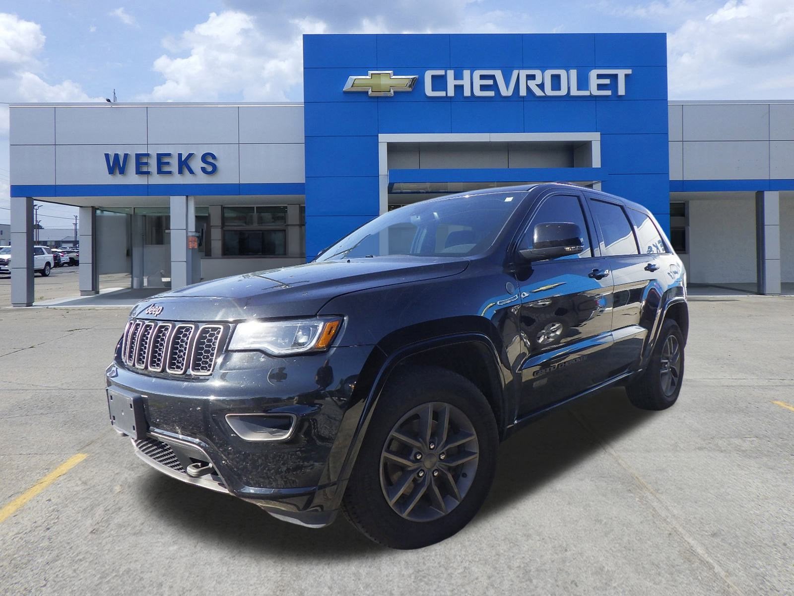 2016 Jeep Grand Cherokee Limited 75th Anniversary in Black — front three-quarter view