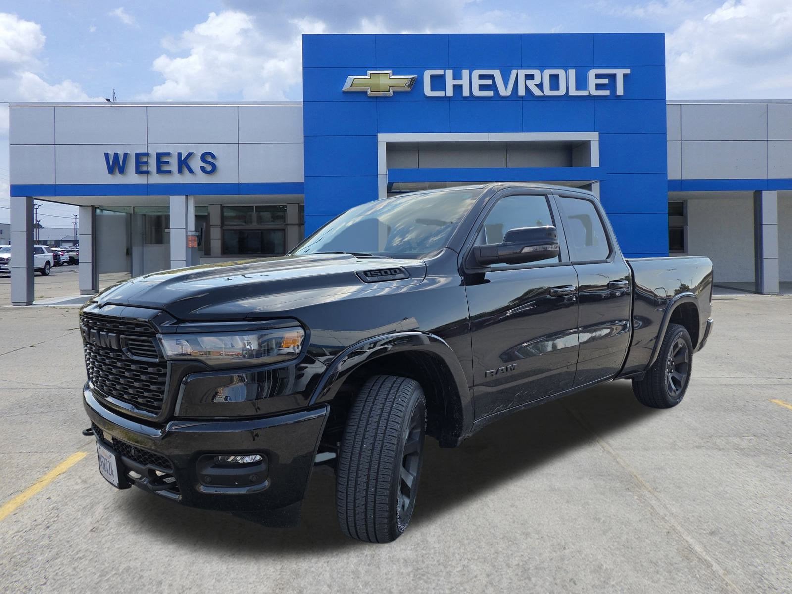 2025 RAM 1500 Big Horn in Black — front three-quarter view