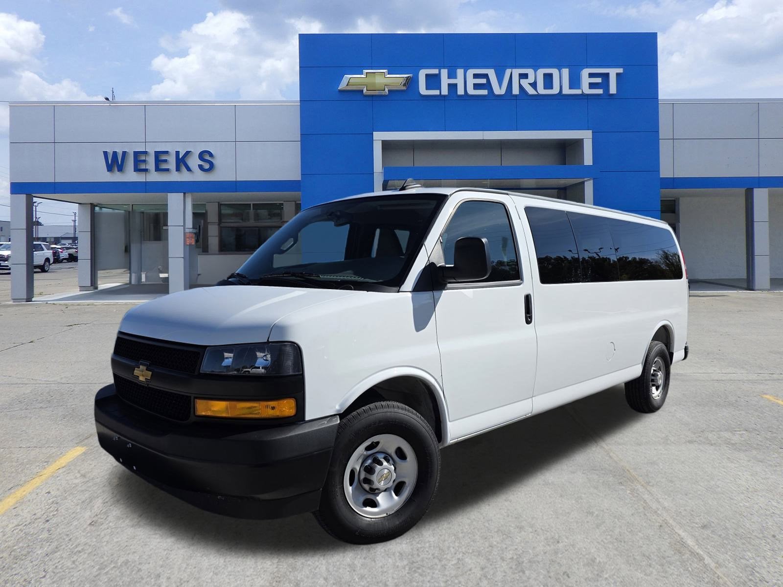 2025 Chevrolet Express Passenger LS in Summit White — front three-quarter view