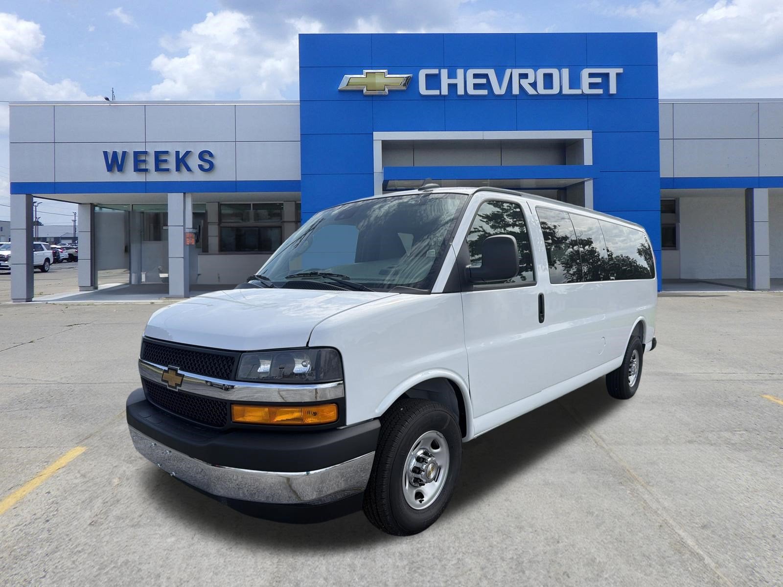 2026 Chevrolet Express Passenger 1LT in Summit White — front three-quarter view