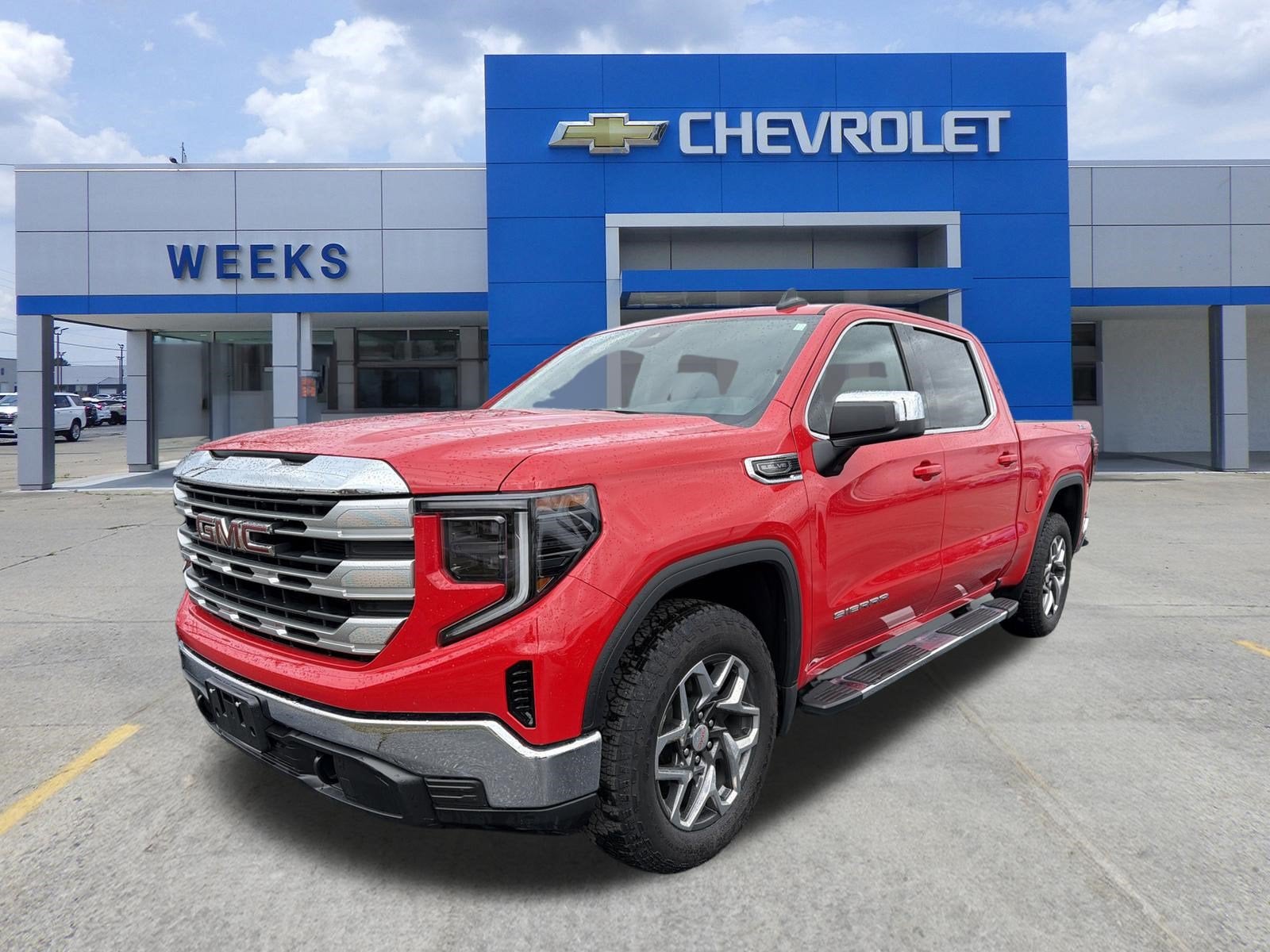 2024 GMC Sierra 1500 SLE in Cardinal Red — front three-quarter view