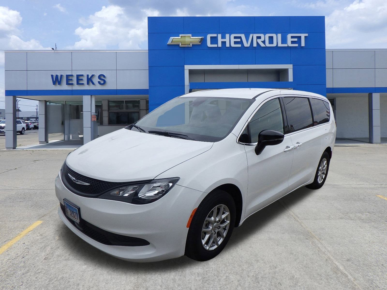 2025 Chrysler Voyager LX in White — front three-quarter view