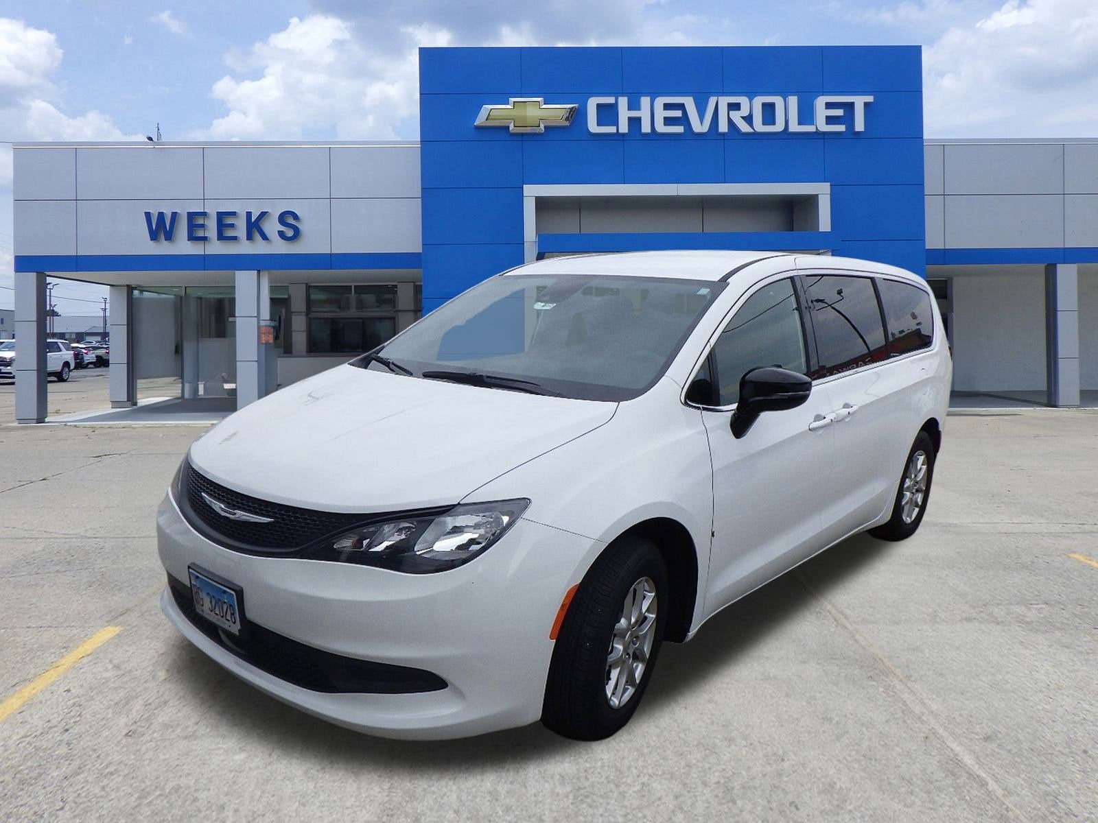 2025 Chrysler Voyager LX in White — front three-quarter view