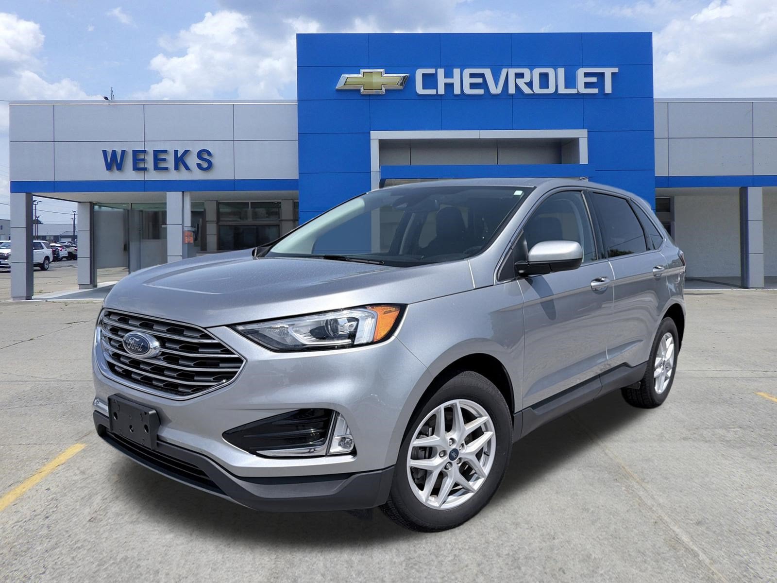 2021 Ford Edge SEL in Silver — front three-quarter view