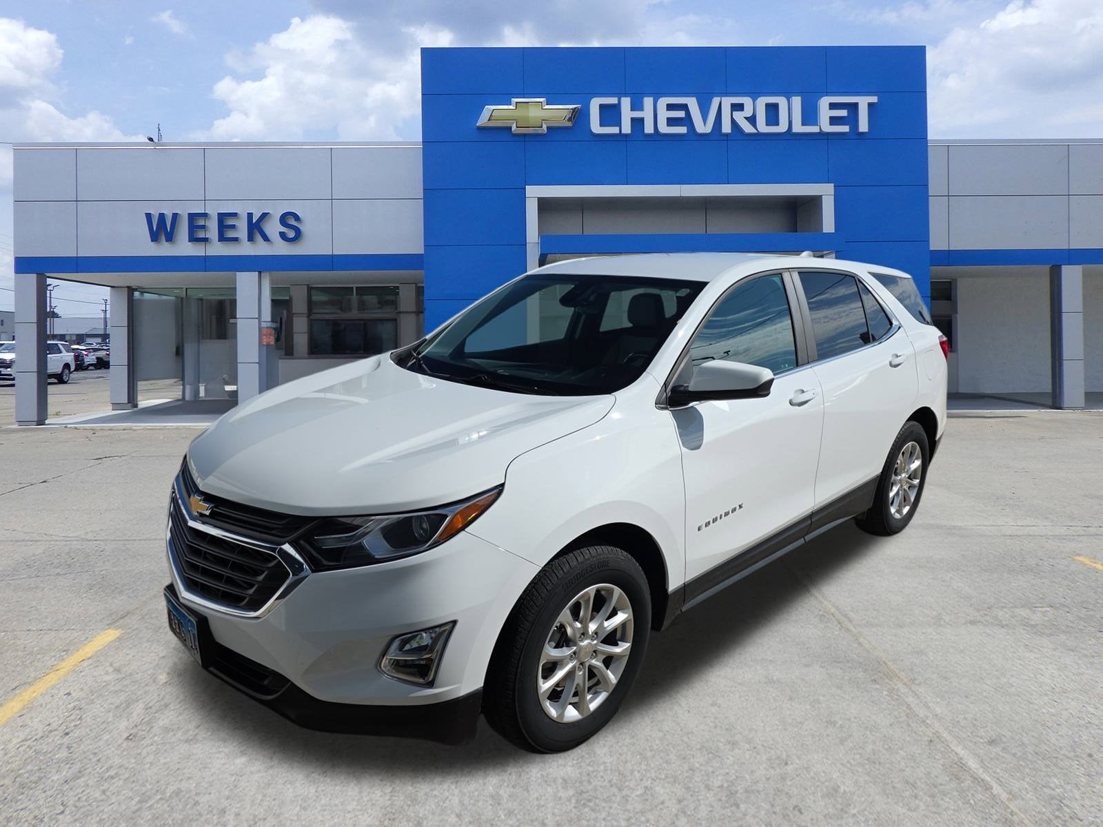 2021 Chevrolet Equinox LT in Summit White — front three-quarter view