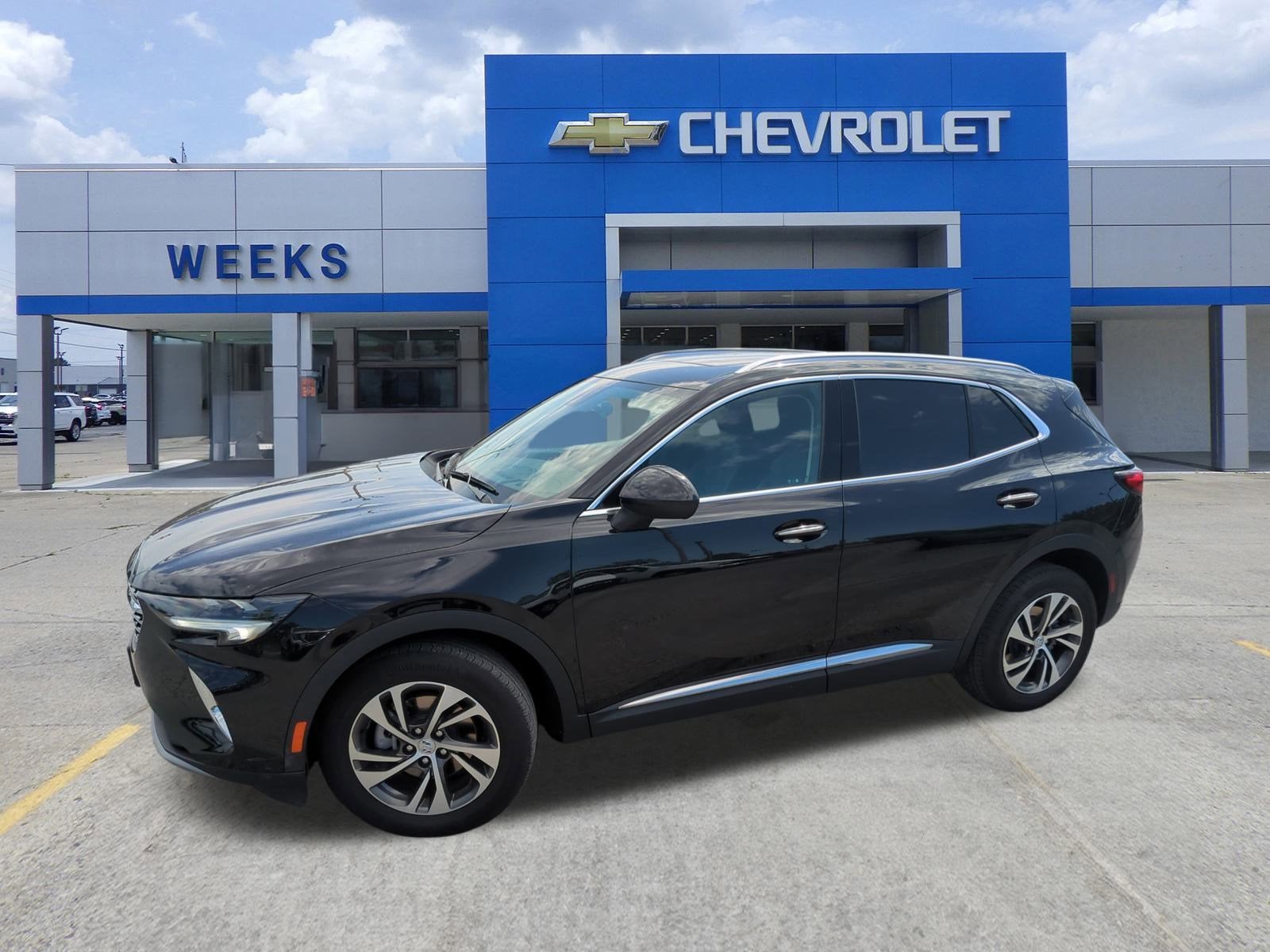 2022 Buick Envision Essence in Ebony Twilight Metallic — front three-quarter view